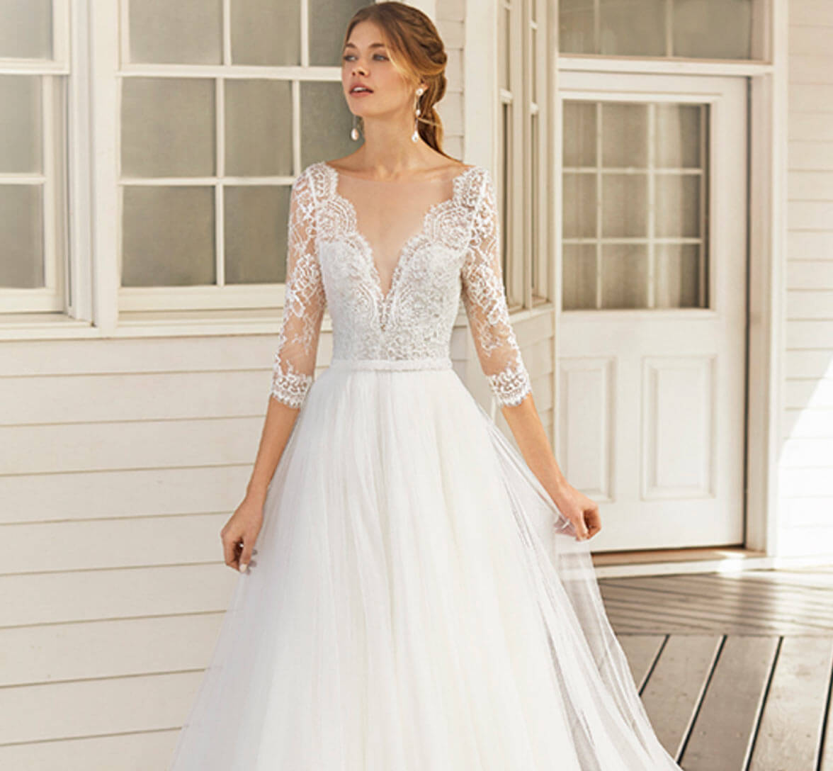 Model wearing a white gown