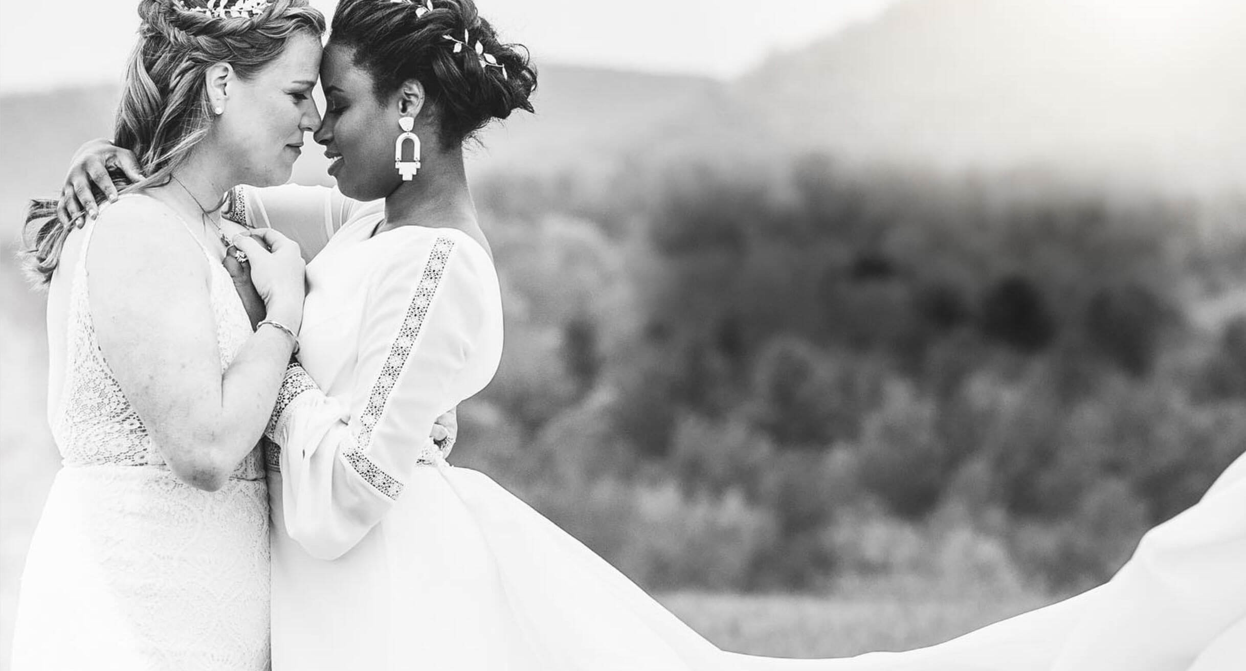 Models wearing a white dresses