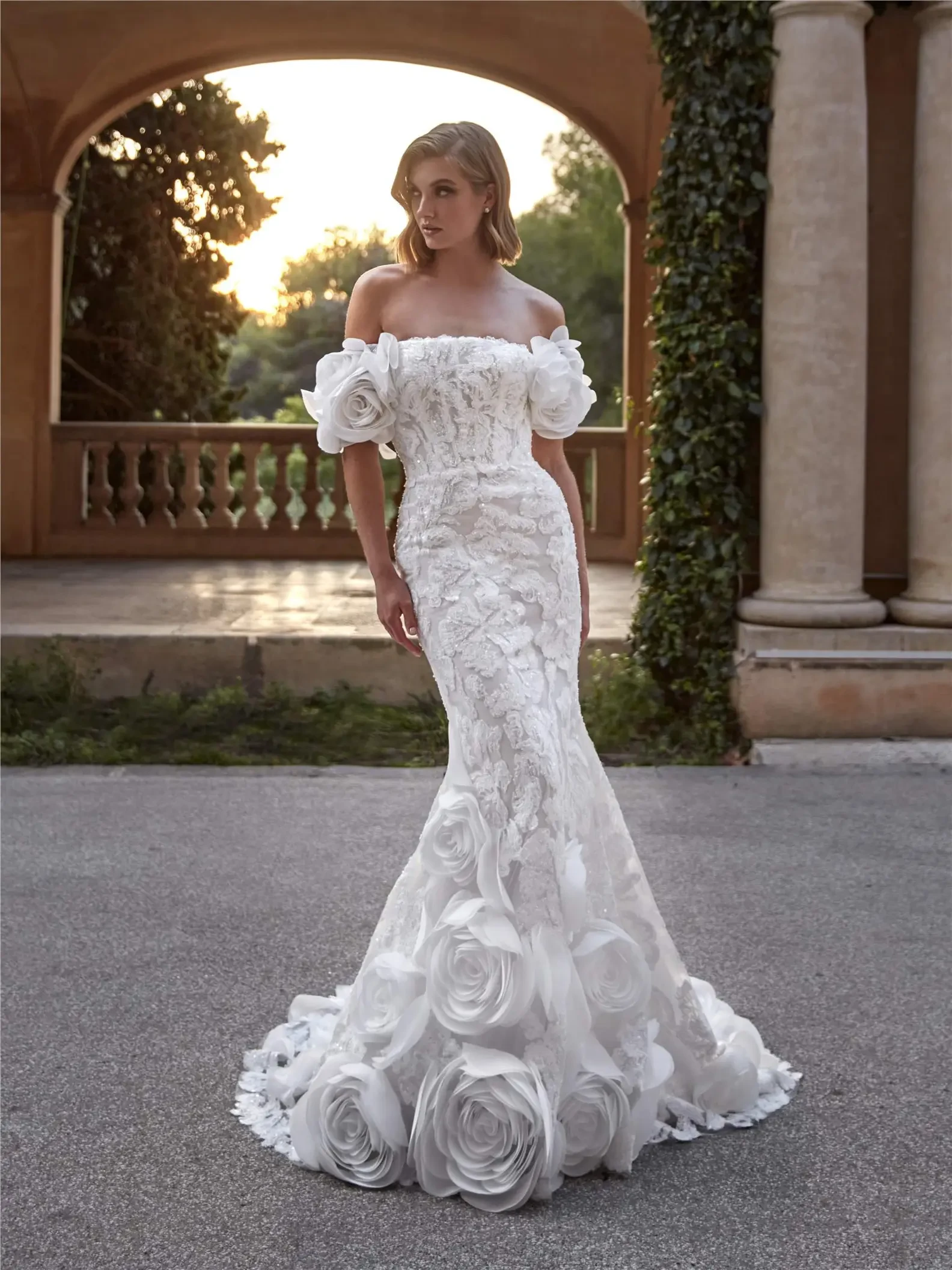 Model wearing a white gown by Pronovias